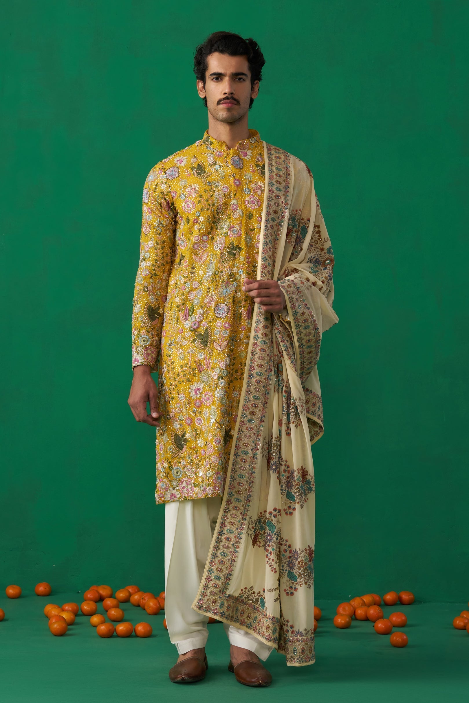 DHAARMIK SAMANI IN PHOOLPANKH HALDI KURTA SET
