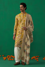 DHAARMIK SAMANI IN PHOOLPANKH HALDI KURTA SET