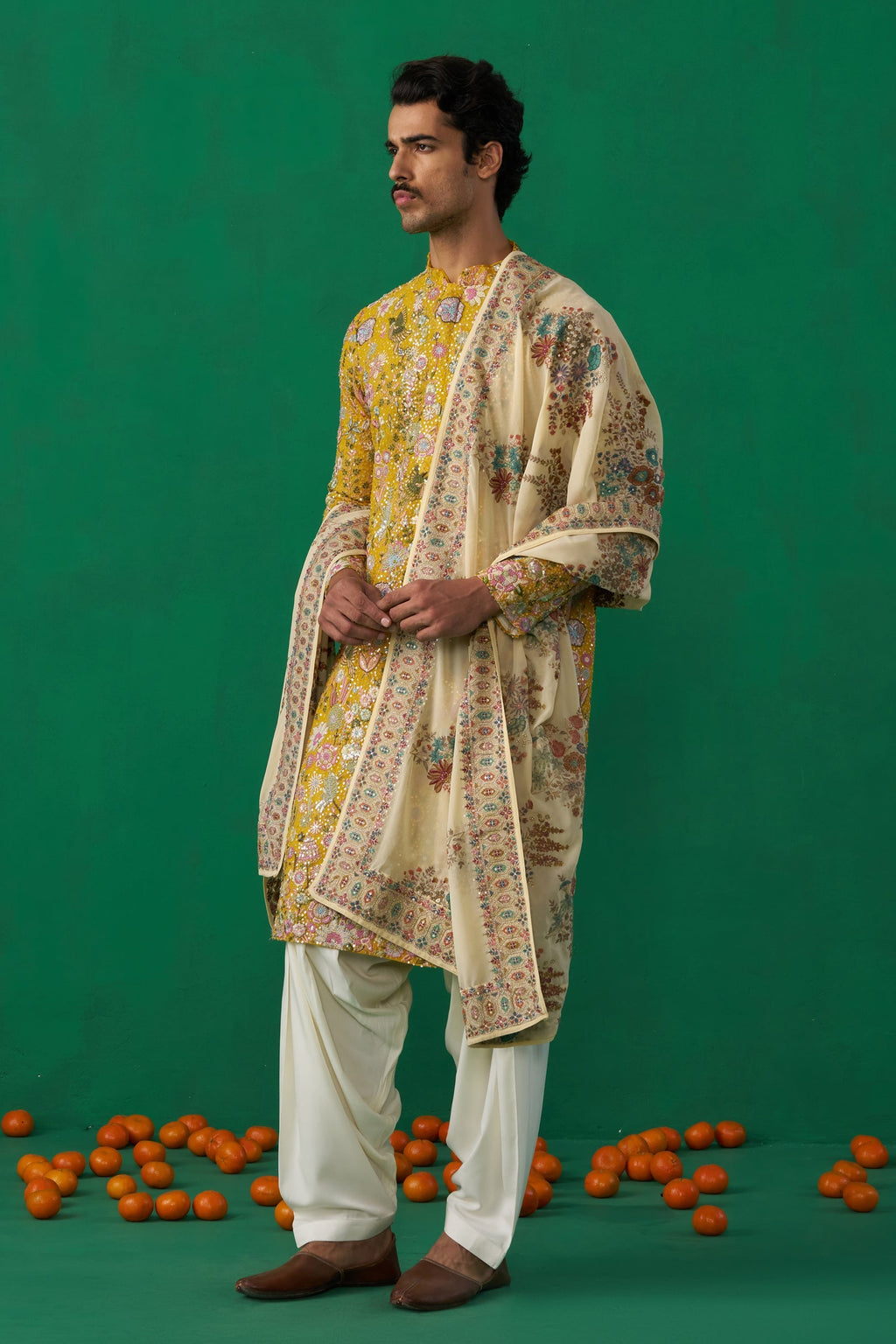 DHAARMIK SAMANI IN PHOOLPANKH HALDI KURTA SET
